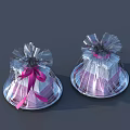 Elegant Decorative Ornament Set with Transparent Wrapping Pink Bow and Silver Base 3d model