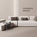 Modern White Sectional Sofa With Brown Cushions And Gray Blanket In Minimalist Space