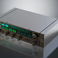 Modern Silver Audio Amplifier With Green Display Panel And Control Knobs