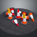 Orange And White Reflective Traffic Cones Arranged On Circular Gray Platform