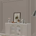 White Modern Sideboard With Glass Doors And Decorative Vase Photo Frames Fruit Figurine