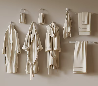 Soft Beige Towels and Bathrobes Hanging on Wall Hooks and Racks 3d model