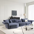 Casual Blue L-shaped Sofa Set with Pillows Marble Coffee Table Fireplace and Artwork