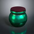 Intricate Hand Carved Green Jar With Red Wooden Lid And Glossy Surface