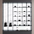 Modern Tea Sets Displayed In Glass Display Cabinet With Marble Backdrop 3d model