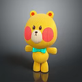Yellow Knitted Bear Toy With Red Cheeks And Green Bow Tie