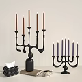 Elegant Black Candelabra with Brown and Purple Candles Minimalist Modern Table Decor