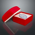 Elegant Silver Pendant With Blue Gemstone In Open Red Jewelry Box