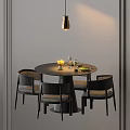 Modern Round Black Dining Table With Four Chairs And Pendant Light In Grey Room