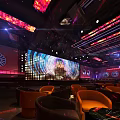 Modern Bar Interior With Colorful Neon Lights LED Screen And Comfortable Orange Seating