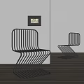 Modern Metal Dining Chairs Featuring Sleek Lines In Interior Wooden Floor Setting