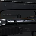 Black Tactical Rifle With Metal And Plastic Parts On Rough Concrete Surface