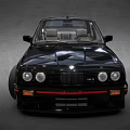 Black Classic BMW Car With Sporty Design Red Accents And Alloy Wheels