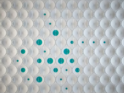 Decorative Wall With White Circular Units And Scattered Green Dots Pattern Design 3d model