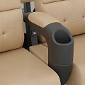 Beige Seats With Black Armrests And Bases Neatly Arranged On Gray Floor Against White Wall