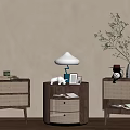 Wooden Bedside Tables with Rattan Drawers Featuring Lamp Photo Frame Vase Clock and Books