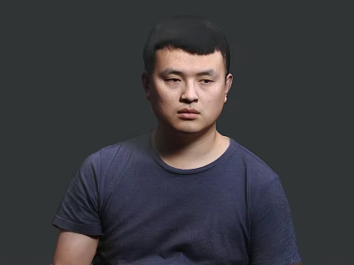 A Man Wearing A Dark Blue T-Shirt Standing Against A Dark Background 3d model