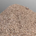 Pile Of Natural Wood Shavings With Brown And Tan Color Tones