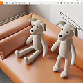 Two Cute Beige Dog Shaped Decorative Pillows Sitting On Orange Sofa