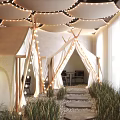 Cozy Café Interior Design With Arched Windows Decorative Lights Green Plants And Wooden Tables