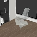 Modern Transparent Leisure Chair With Unique Twisted Design On Wooden Floor