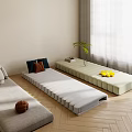 Soft Padded Floor Mattresses In Gray White Green With Wooden Floor Window And Potted Plant
