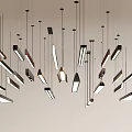Modern Minimalist Pendant Lights with Various Shapes and Colors Hanging from Ceiling