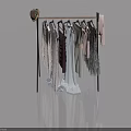 Stylish Clothes Rack With Various Hanging Garments And Hat On Reflective Floor 3d model
