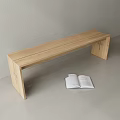 Simple Light Wood Bench With Modern Design Next To Open Book 3d model