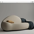 Beige Lazy Sofa With Yellow Pillow And Dark Green Blanket For Cozy Home Decor