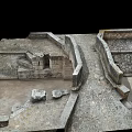 Ancient Stone Ruins Structure Featuring Stone Walls Stairs Archway And Paved Floor