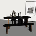 Minimalist Oval Black Dining Table and Chair Set with Golden Leg Accents and Decorative Plant
