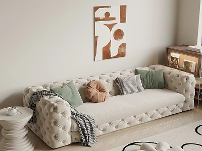 Cream Tufted Sectional Sofa With Green Striped Round Pillows Side Table And Wall Art 3d model