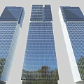 Modern High Rise Office Building With Glass Curtain Walls And Tree Reflections