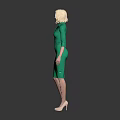 Blonde Woman in Fitted Green Dress with Tie Detail Against Dark Background Wearing High Heels