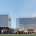 Modern Commercial Office Building Exterior With Glass Curtain Walls And Urban Street View