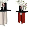 Metallic Vase With White Pink Flowers On Black Round Side Tables Red White Legs