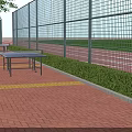 School Outdoor Sports Area With Table Tennis Tables Green Lawn And Red Track