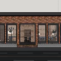 Warm Cafe Interior With Exposed Brick Wall Wooden Tables And Blue Seating