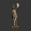 Spotted Deer Taxidermy With Large Antlers On Stone Base Against Dark Background