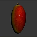 Fresh Ripe Mango with Yellow and Red Skin on Dark Background with Shiny Reflection