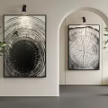 Contemporary Interior Featuring Tree Ring Artworks White Walls Arched Doorway And Green Plant