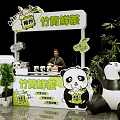 Liuzhou Bamboo Tube Fresh Tea Kiosk With Panda Decor And Green Plants