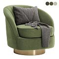Green Single Sofa With Gray Striped Pillow And Gray Blanket On Gold Base