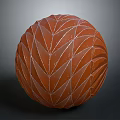Decorative Orange Sphere With Intricate Leaf Shaped Geometric Surface Patterns 3d model