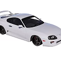 White Sleek Two Door Sports Car With Rear Spoiler And Sporty Wheels
