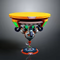 Vibrant Mechanical Round Table With Yellow Tabletop And Green Orange Accents