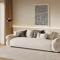 Modern White Multi Seater Sofa With Throw Pillows And Abstract Wall Art In Living Room
