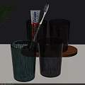 Daily Washing Essentials With Colorful Glass Cups Toothpaste Toothbrush And Green Leaves On Wooden Tray