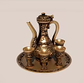 Elegant Golden Wine Bottle And Glasses Set With Intricate Patterns On Decorative Tray
